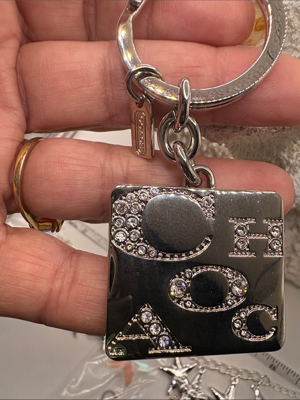 Coach Silver-Tone Crystal Logo Square Keychain
